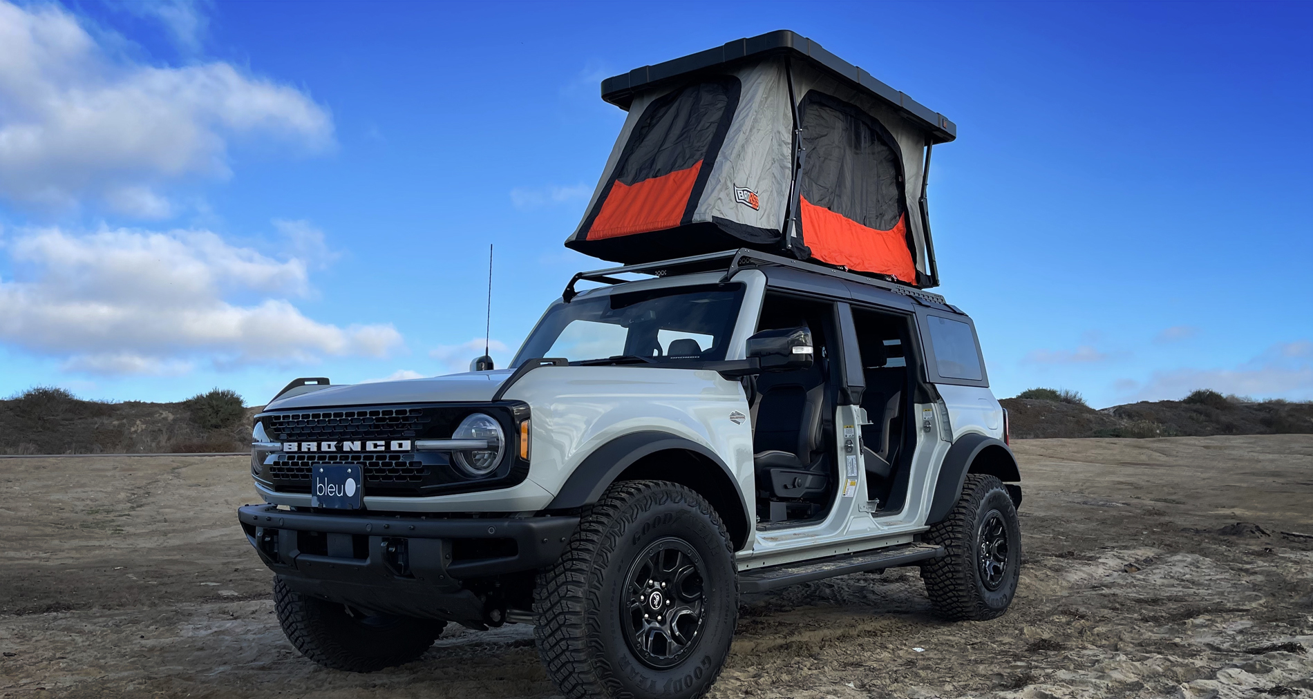 badass tents new ford bronco with roof rack and roof top tent at beach slider-4