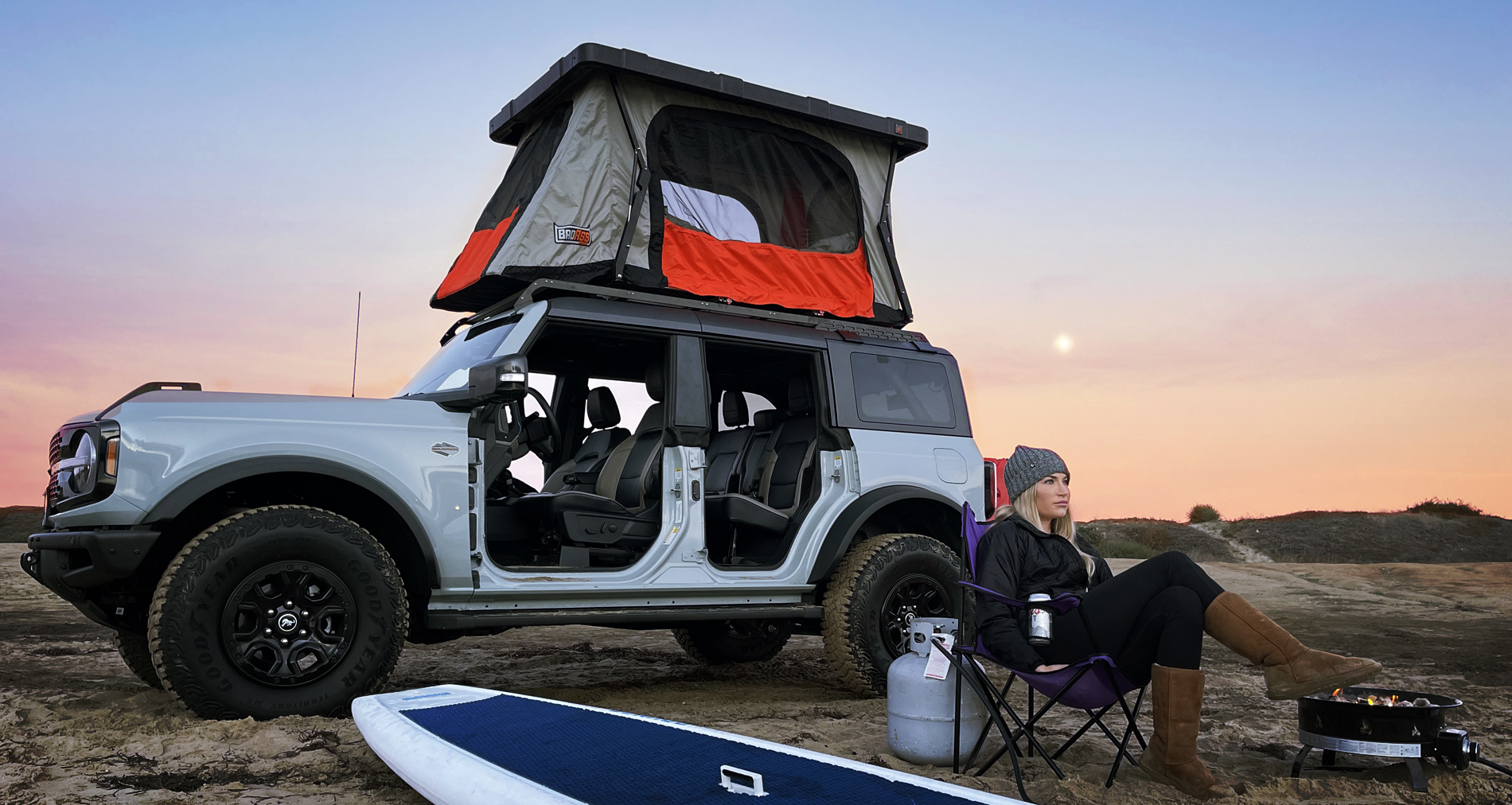 badass tents new ford bronco with roof rack and roof top tent at beach slider
